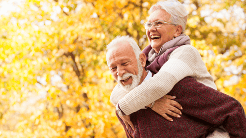 OLDER COUPLE LAUGHING